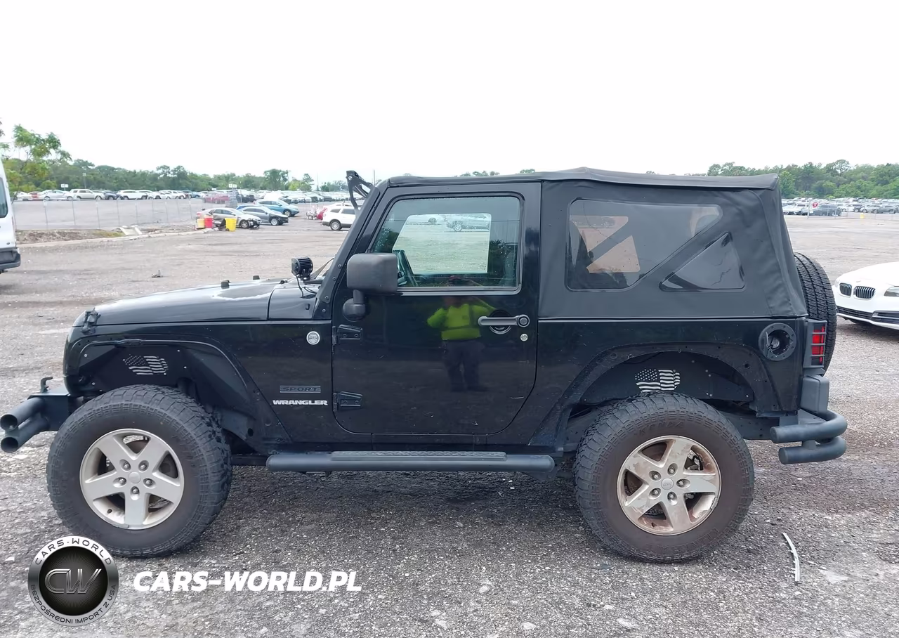 2011 Jeep Wrangler Sport VIN:1J4AA2D12BL579570 - 14