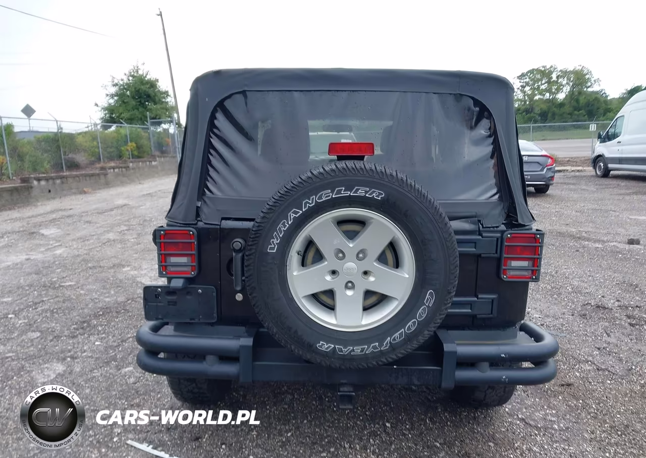 2011 Jeep Wrangler Sport VIN:1J4AA2D12BL579570 - 16