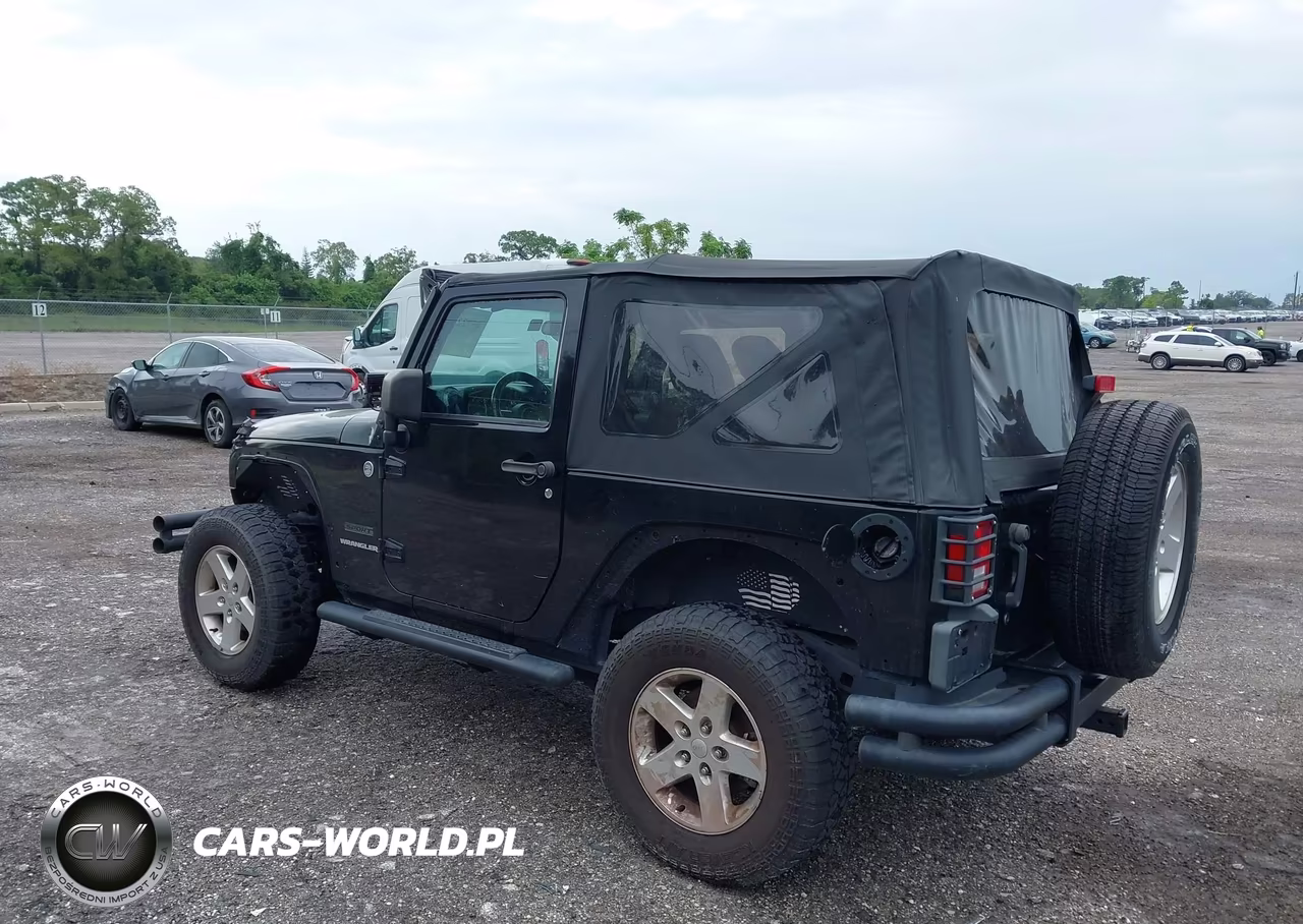 2011 Jeep Wrangler Sport VIN:1J4AA2D12BL579570 - 3