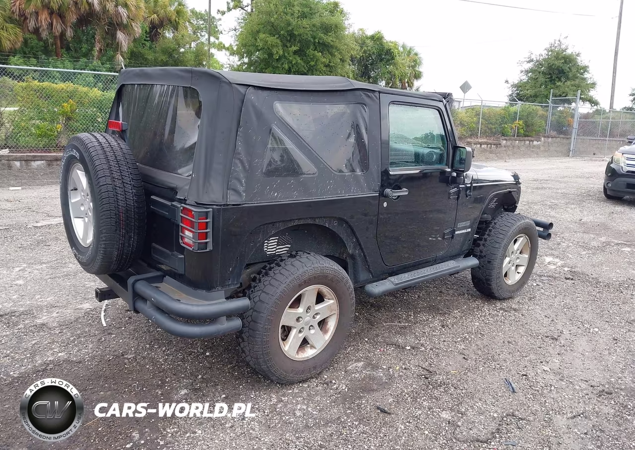 2011 Jeep Wrangler Sport VIN:1J4AA2D12BL579570 - 4