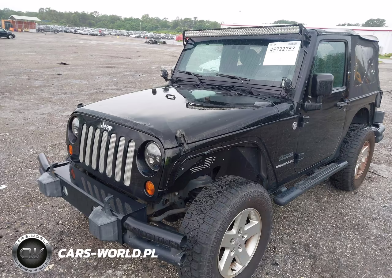 2011 Jeep Wrangler Sport VIN:1J4AA2D12BL579570 - 6