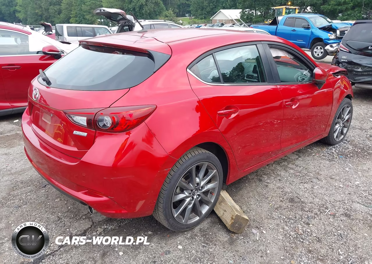 2018 Mazda Mazda3 Touring VIN:3MZBN1L34JM258975 - 4