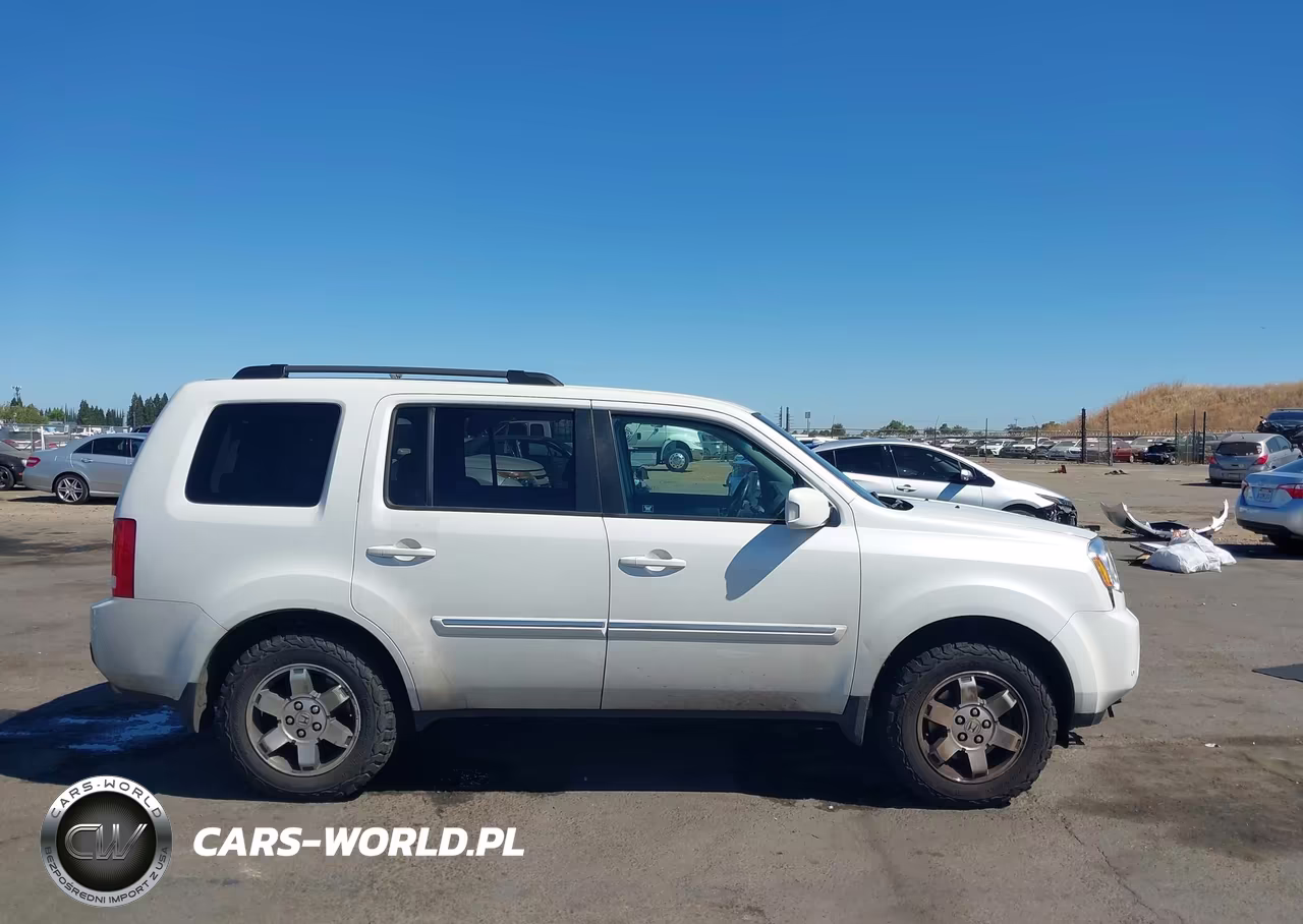 2011 Honda Pilot Touring VIN:5FNYF4H90BB024878 - 13