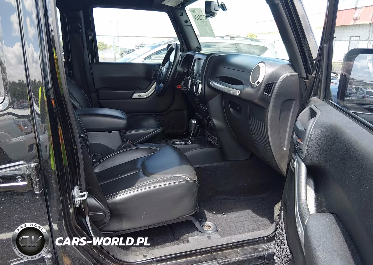 2013 Jeep Wrangler Unlimited Sahara VIN:1C4BJWEG6DL697077 - 5