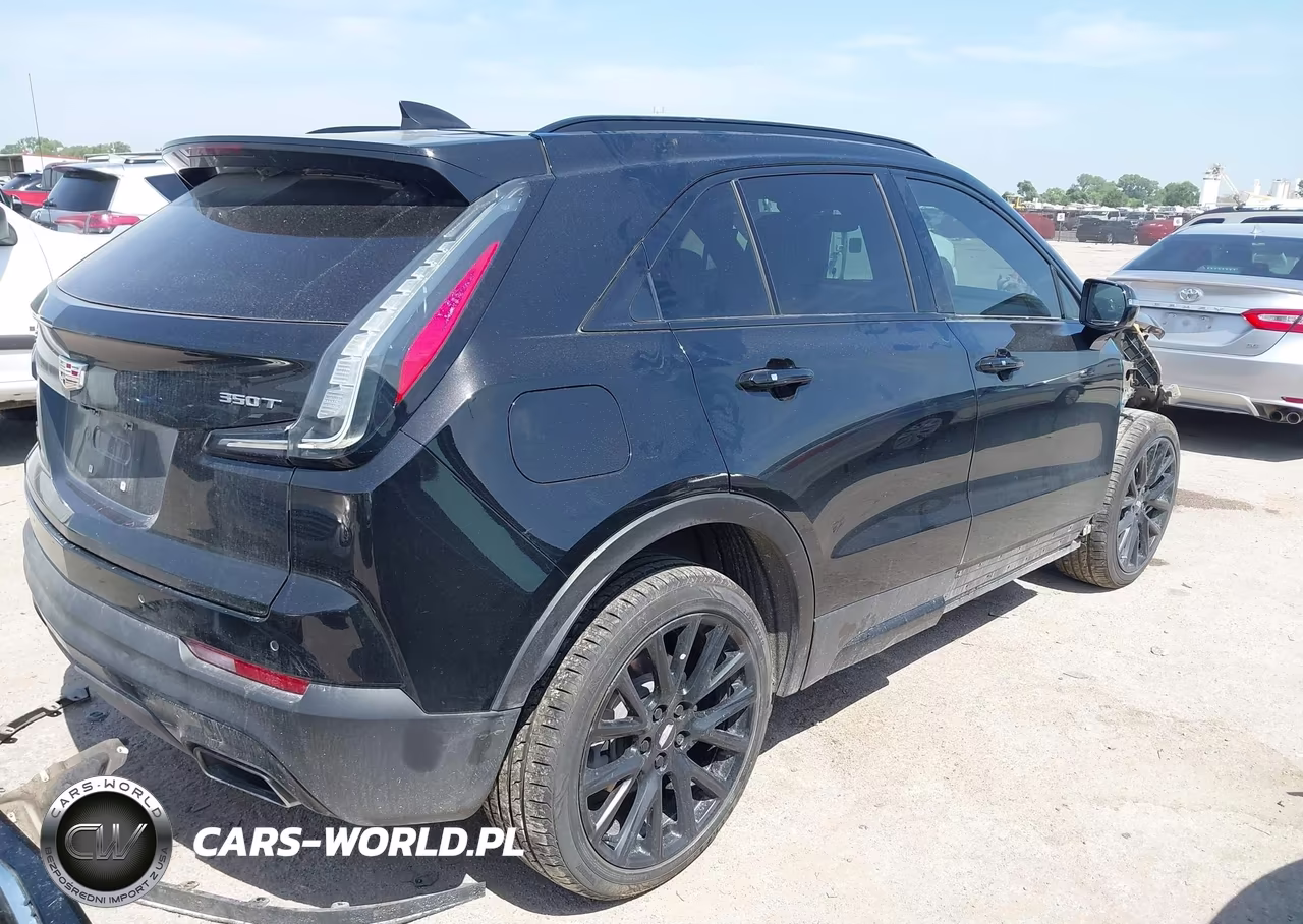 2023 Cadillac Xt4 Fwd Sport VIN:1GYFZER47PF104473 - 4