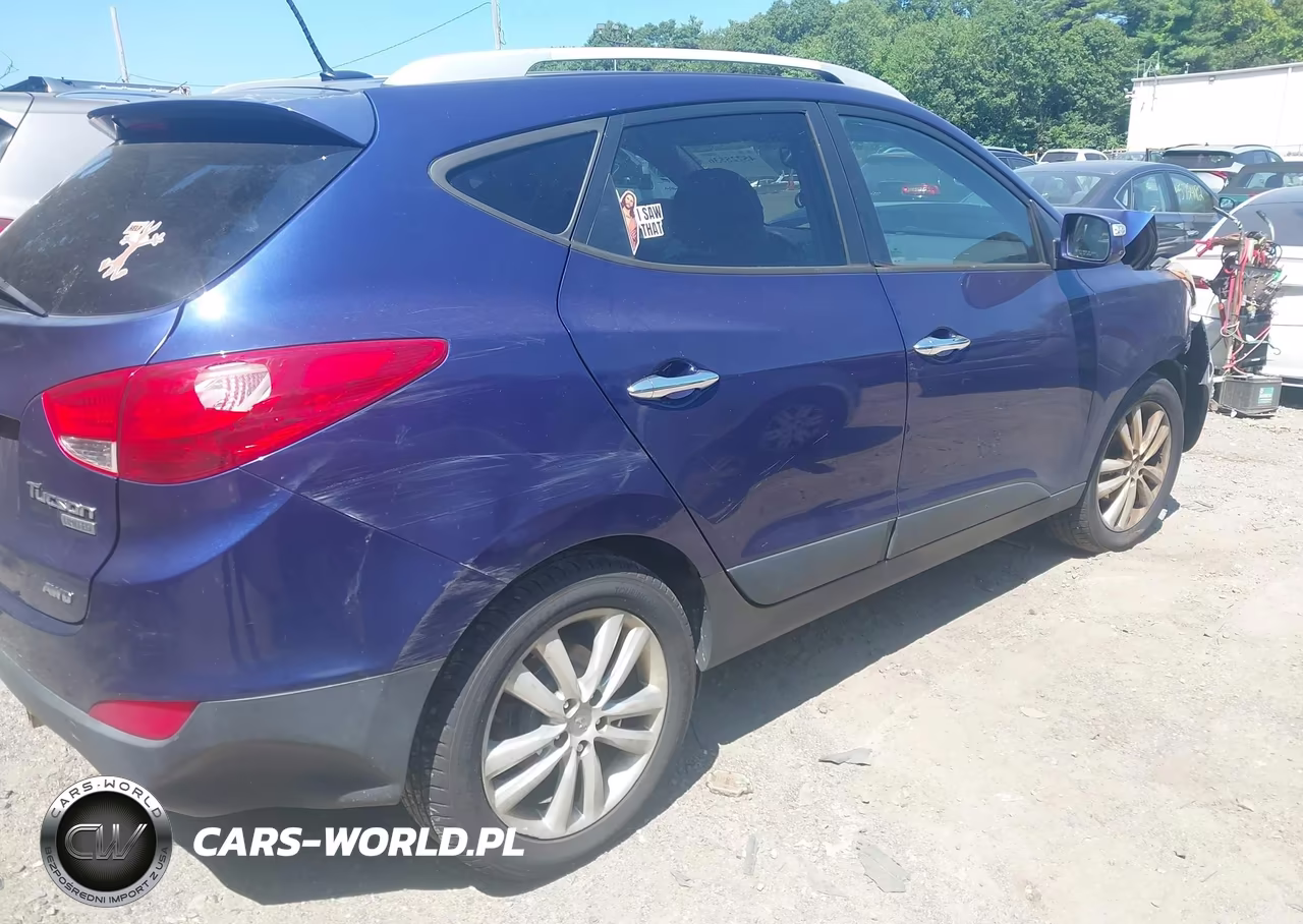 2011 Hyundai Tucson Limited VIN:KM8JUCAC0BU312765 - 4