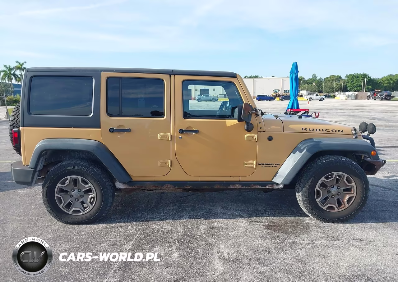 2014 Jeep Wrangler Unlimited Rubicon VIN:1C4HJWFGXEL112155 - 13