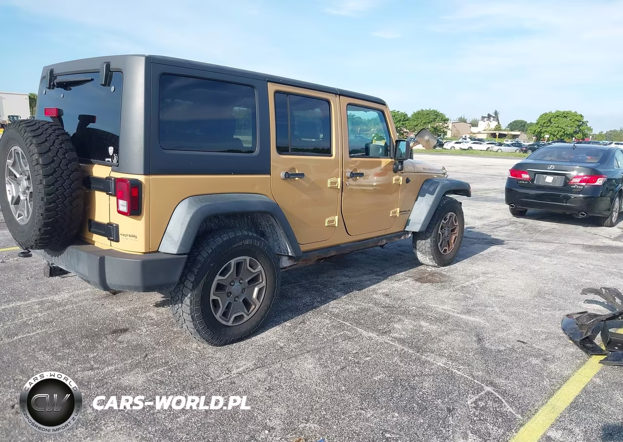 2014 Jeep Wrangler Unlimited Rubicon VIN:1C4HJWFGXEL112155 - 4