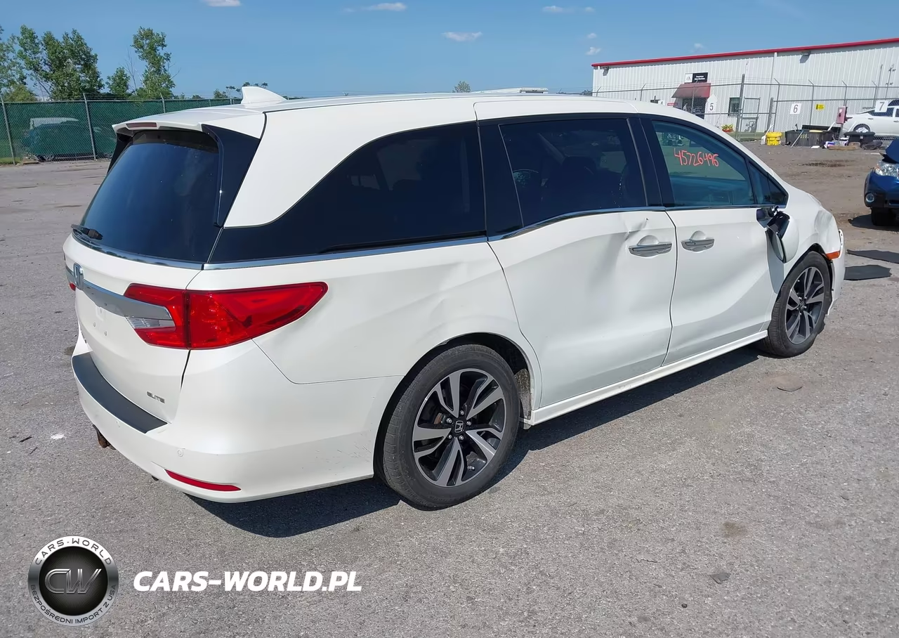 2018 Honda Odyssey Elite VIN:5FNRL6H97JB099973 - 4