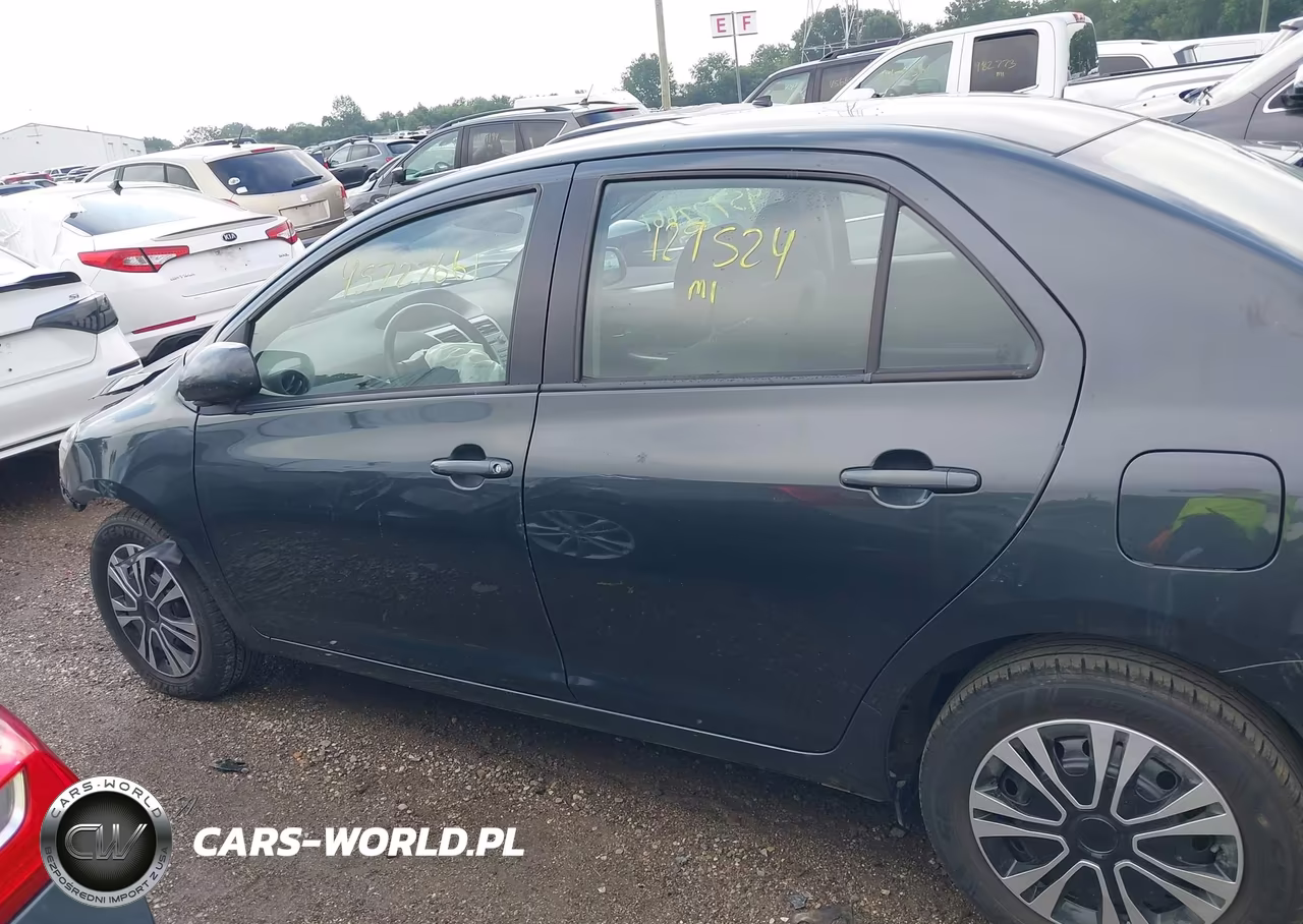 2009 Toyota Yaris VIN:JTDBT903591325488 - 14