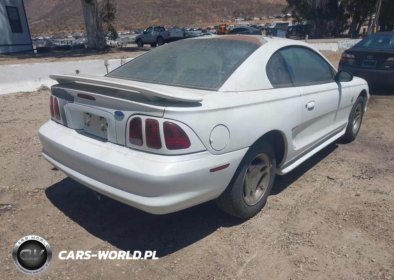 1997 Ford Mustang VIN:1FALP4046VF140549 - 4