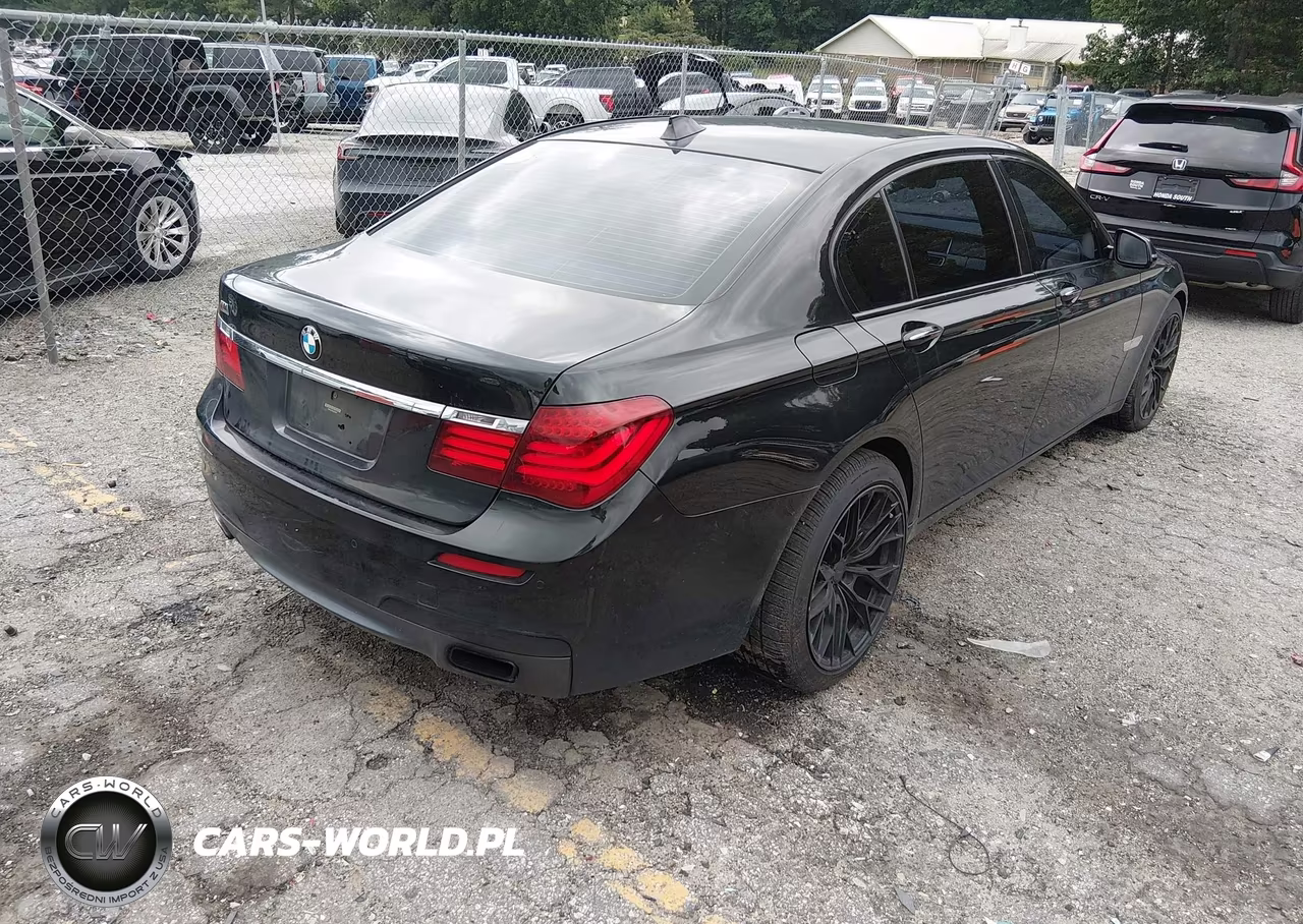 2014 BMW 740Li VIN:WBAYE4C58ED138062 - 4