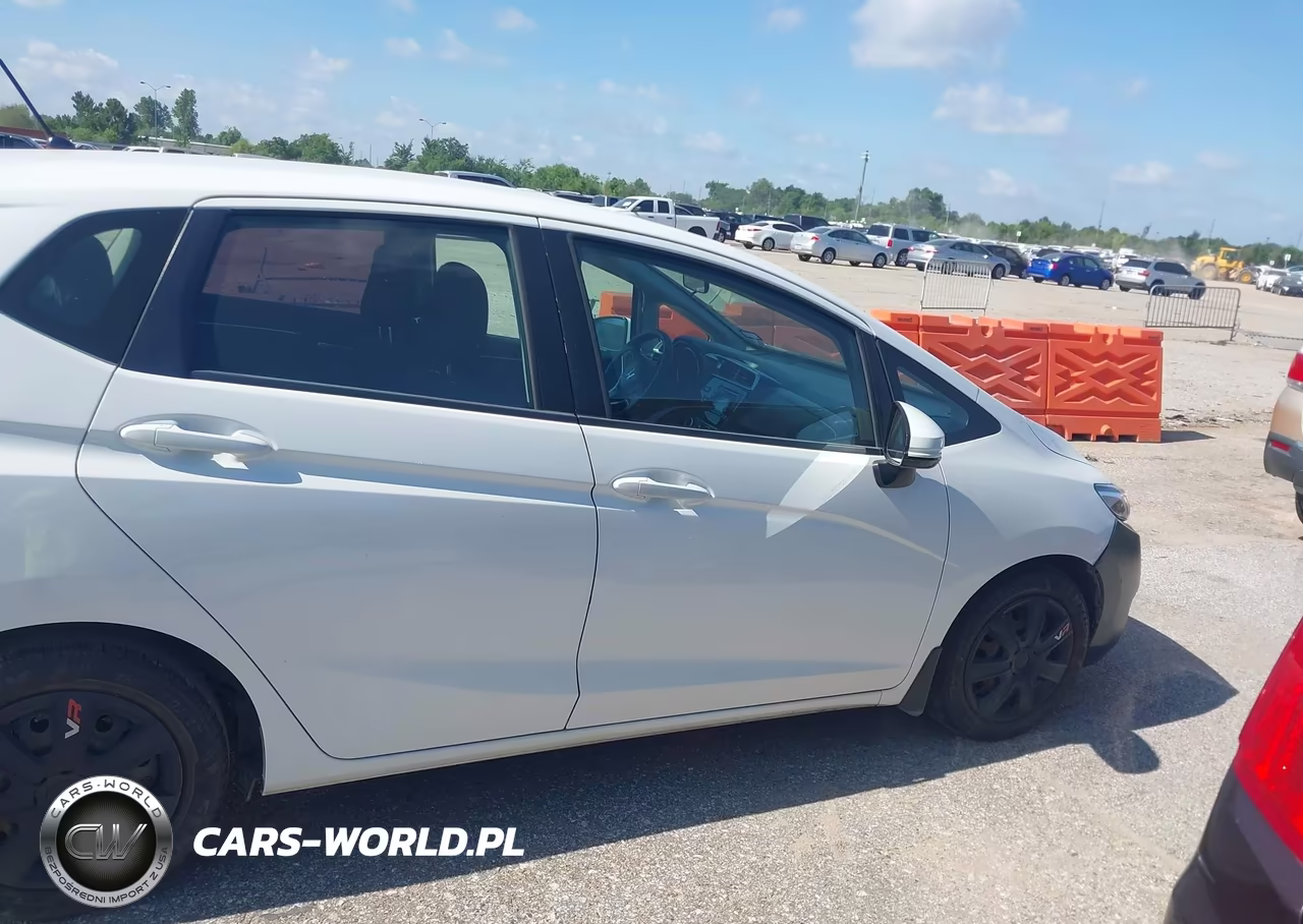 2015 Honda Fit Lx VIN:3HGGK5H59FM785311 - 13