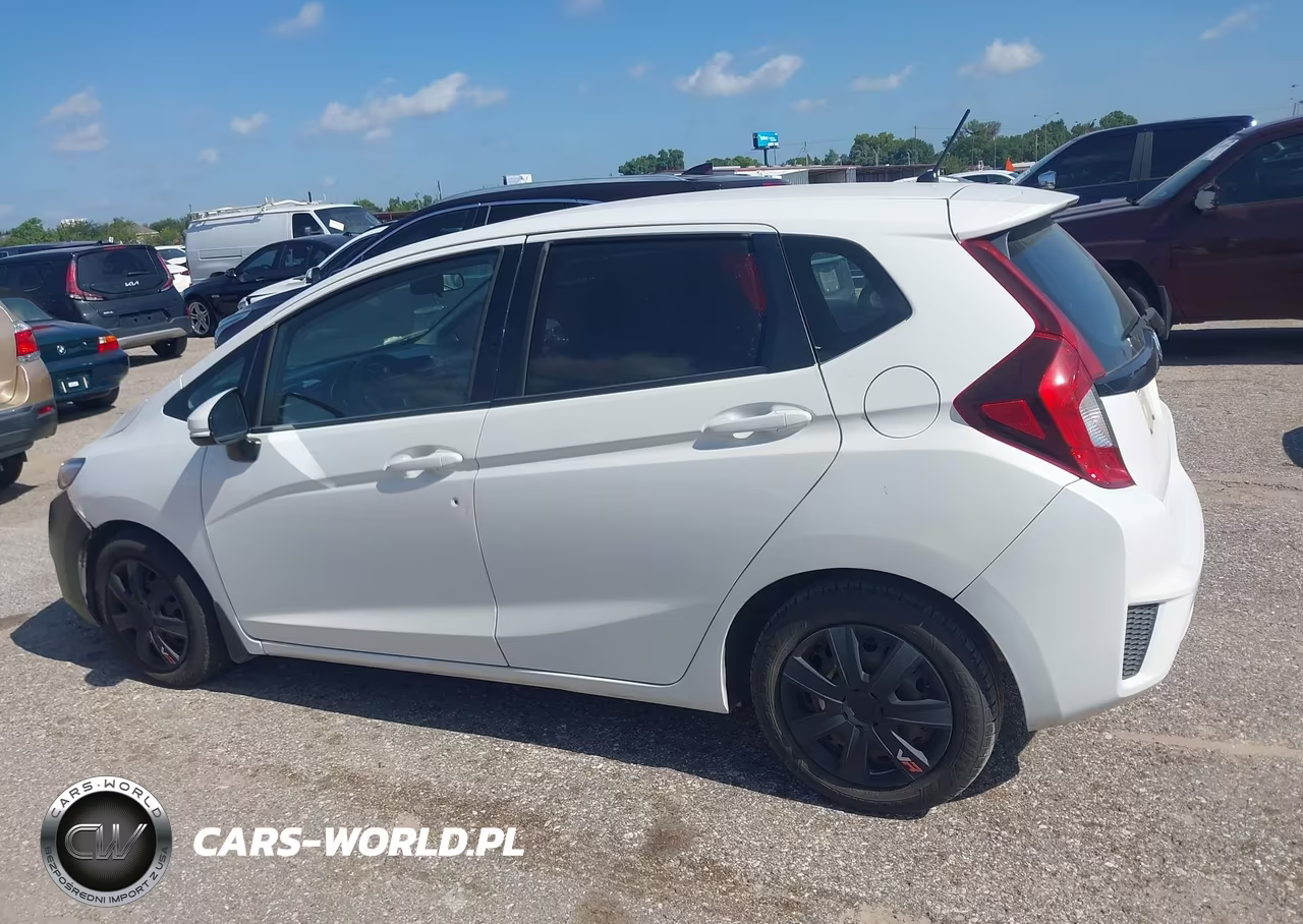 2015 Honda Fit Lx VIN:3HGGK5H59FM785311 - 14
