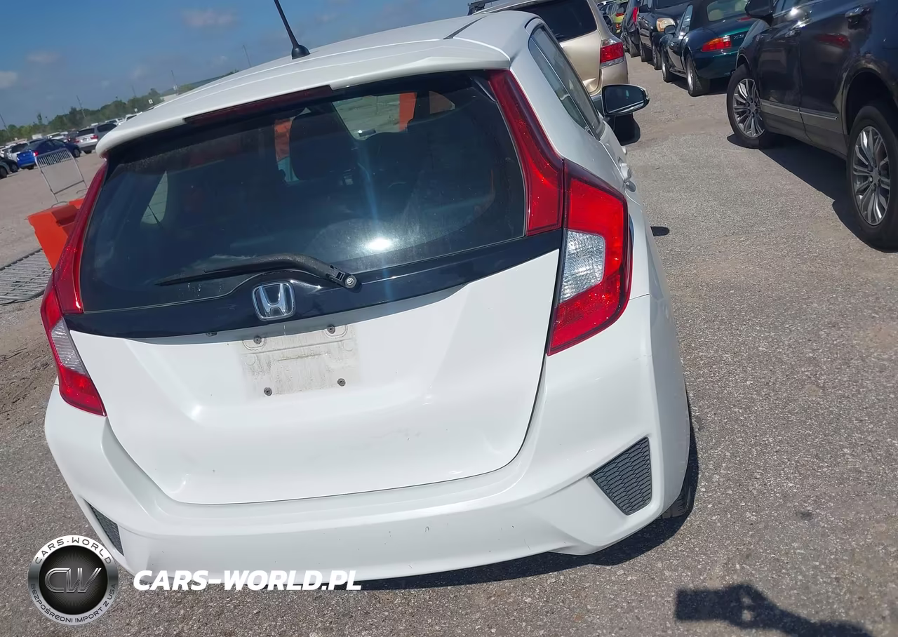 2015 Honda Fit Lx VIN:3HGGK5H59FM785311 - 16