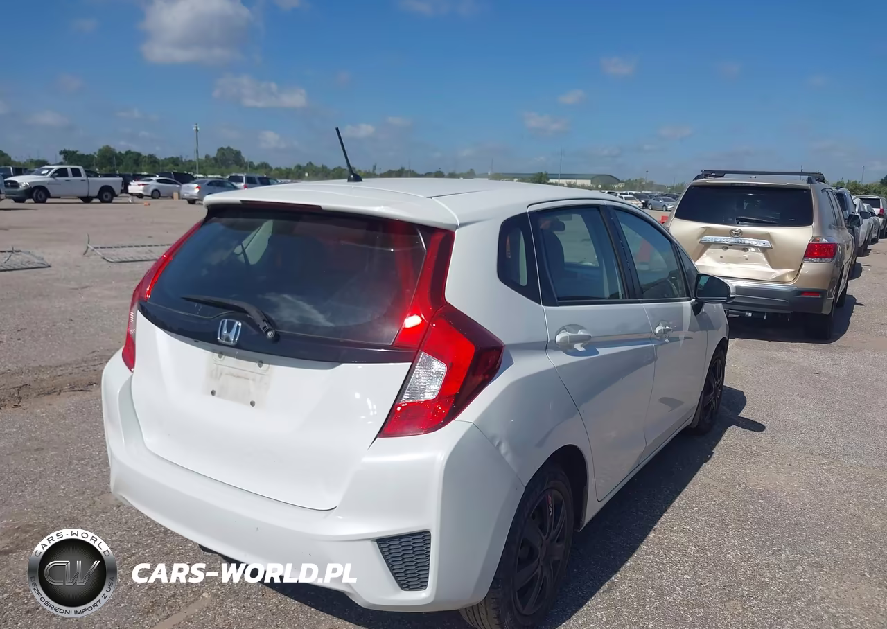 2015 Honda Fit Lx VIN:3HGGK5H59FM785311 - 4