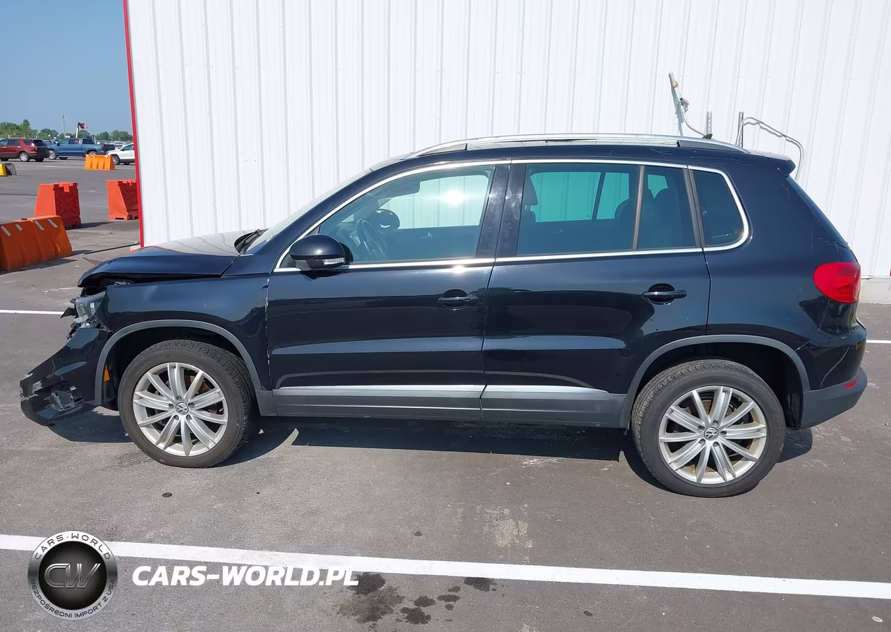 2014 Volkswagen Tiguan Sel VIN:WVGBV3AX3EW542488 - 13