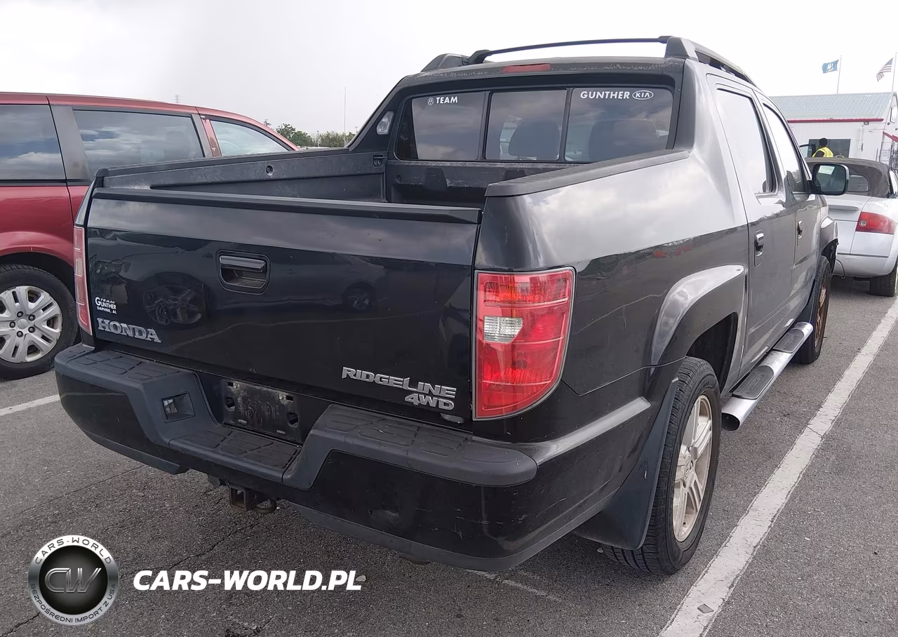 2011 Honda Ridgeline Rtl VIN:5FPYK1F55BB008323 - 4