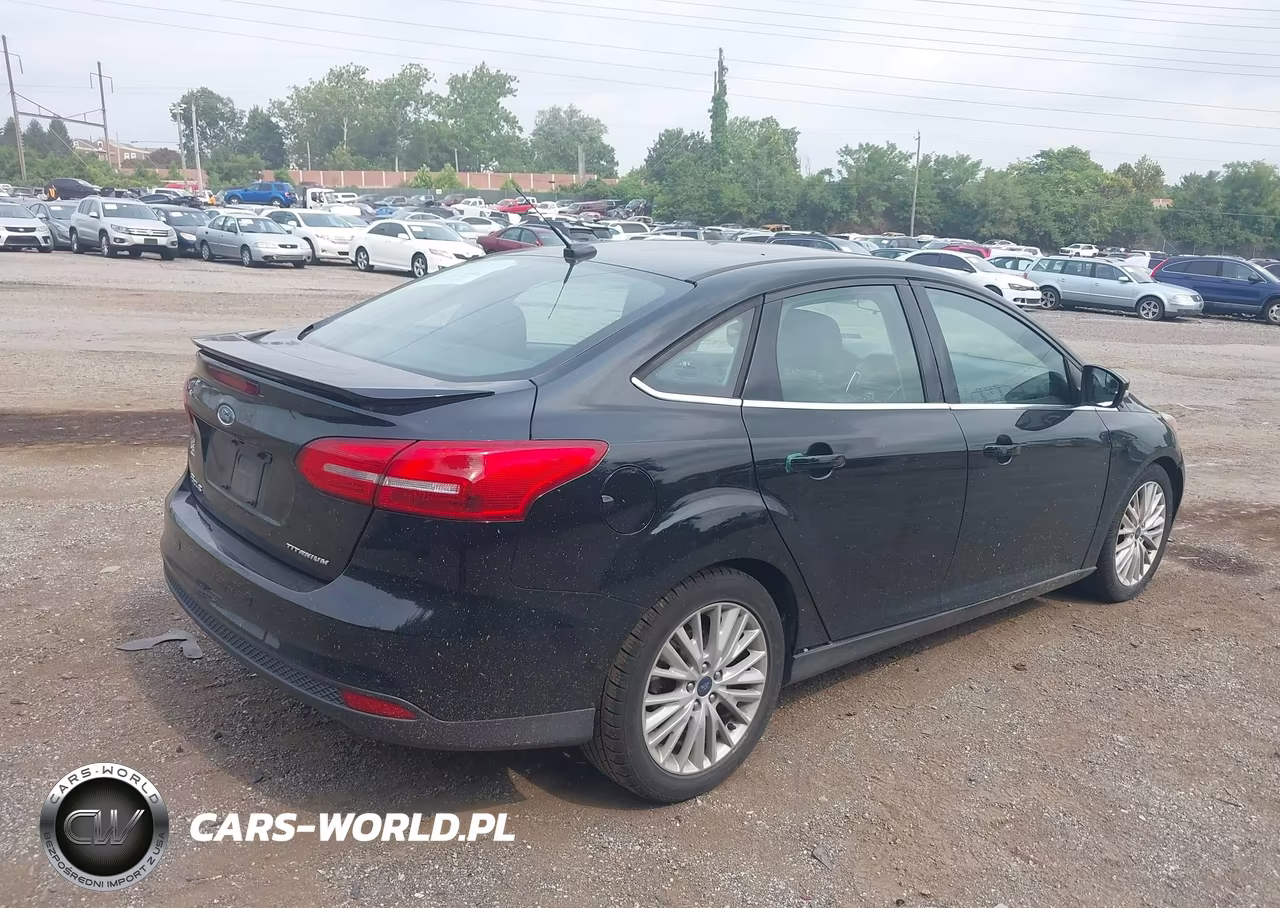 2017 Ford Focus Titanium VIN:1FADP3J26HL256481 - 4