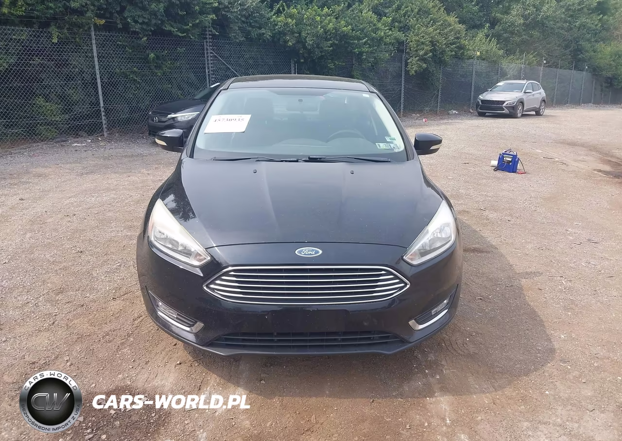 2017 Ford Focus Titanium VIN:1FADP3J26HL256481 - 6