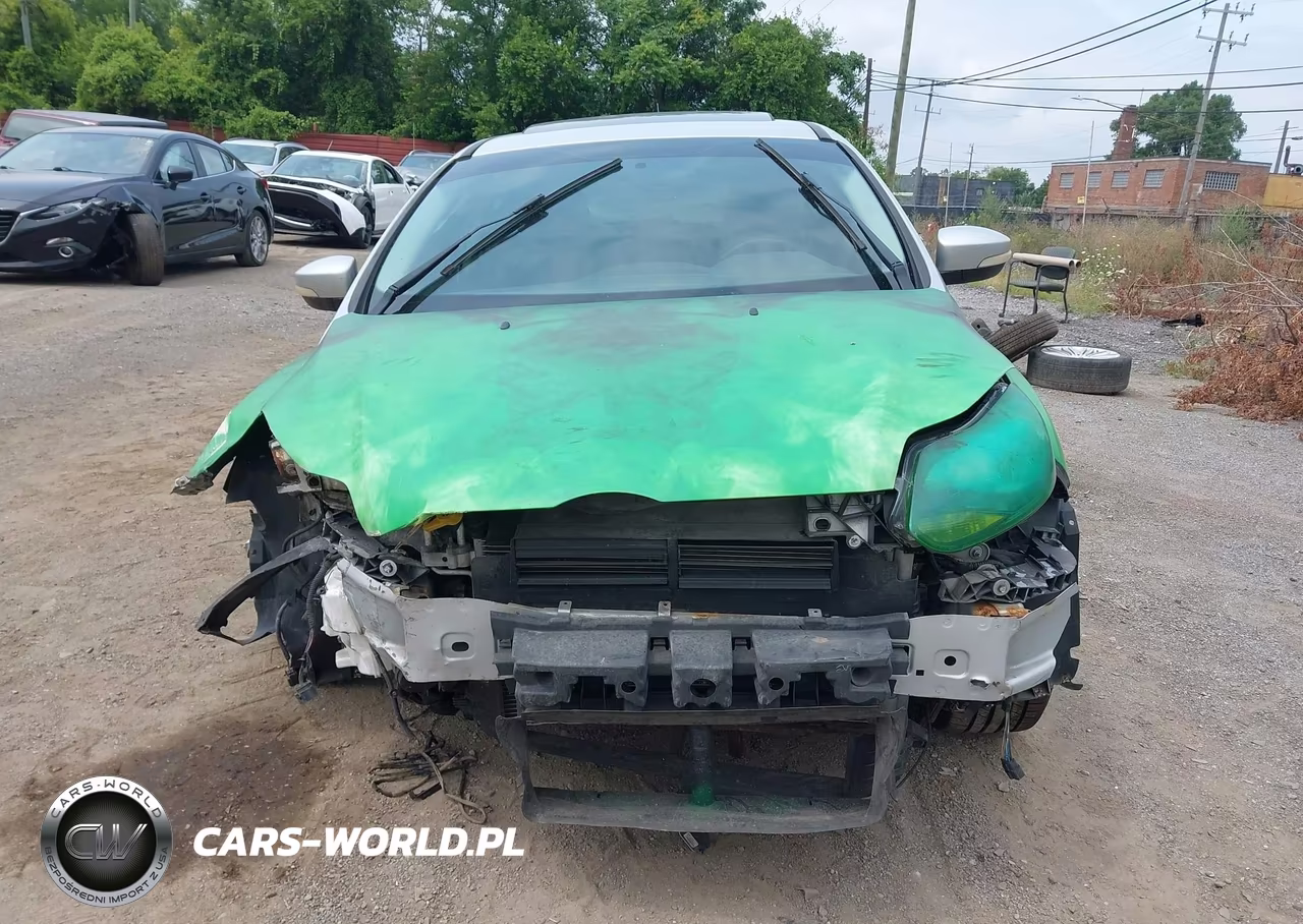 2013 Ford Focus Titanium VIN:1FADP3N27DL295827 - 11