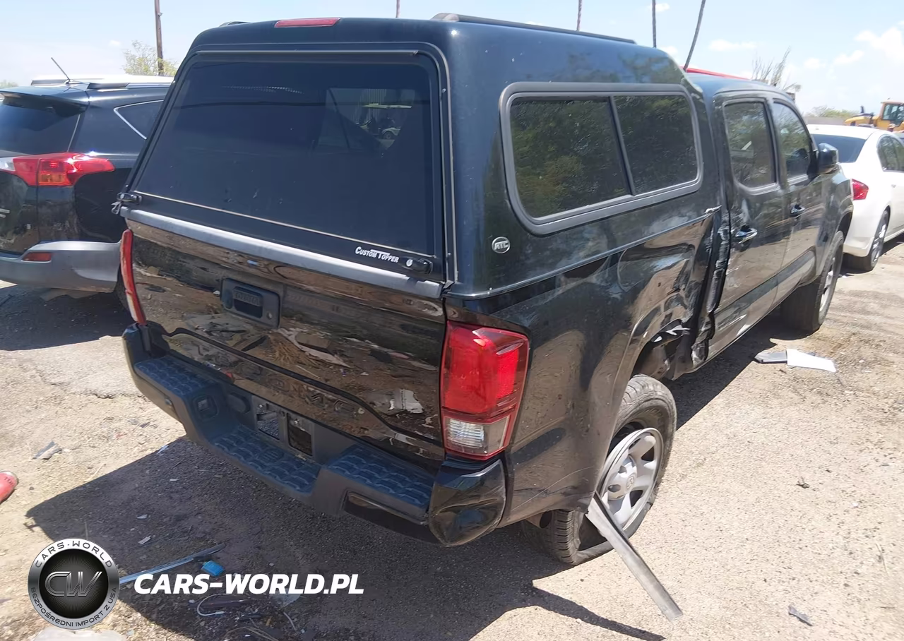 2018 Toyota Tacoma Sr VIN:5TFAX5GN0JX123613 - 4