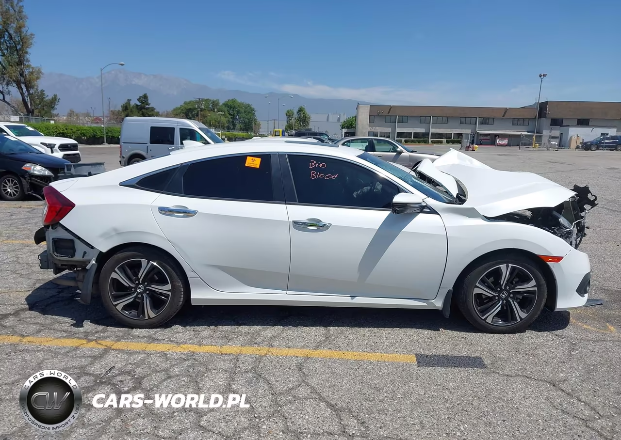 2018 Honda Civic Touring VIN:JHMFC1F94JX014410 - 16