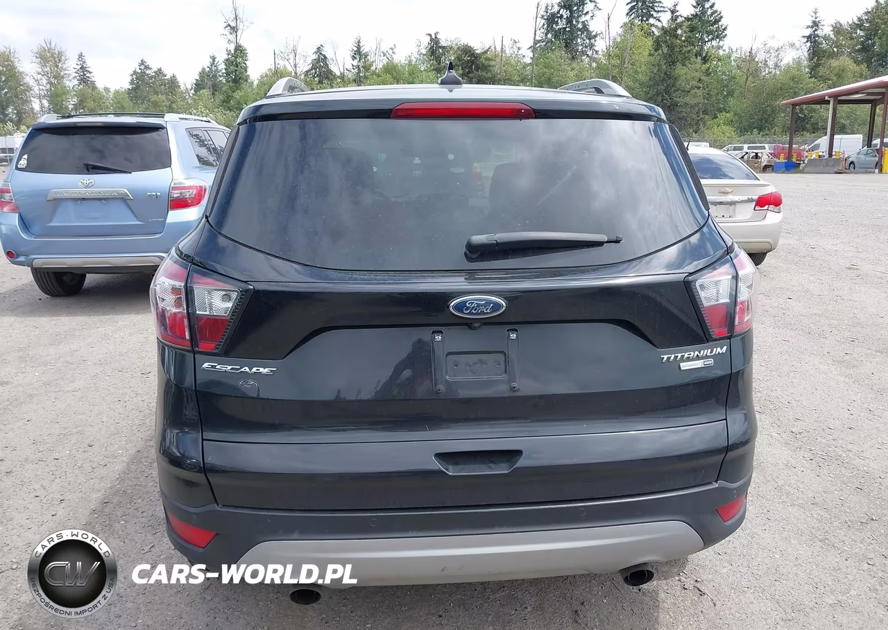 2018 Ford Escape Titanium VIN:1FMCU9J91JUA59714 - 16