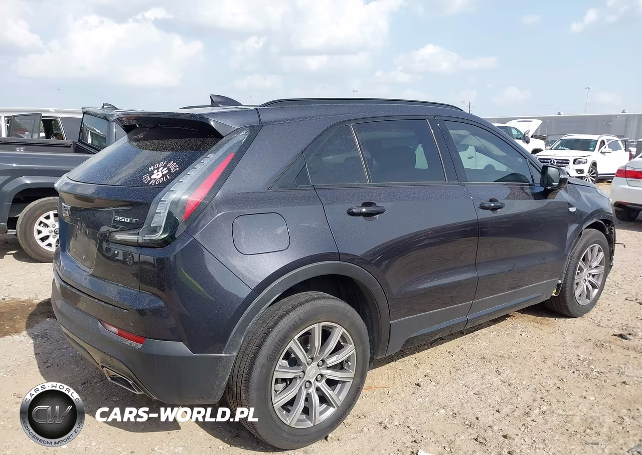 2023 Cadillac Xt4 Fwd Sport VIN:1GYFZER49PF123476 - 4