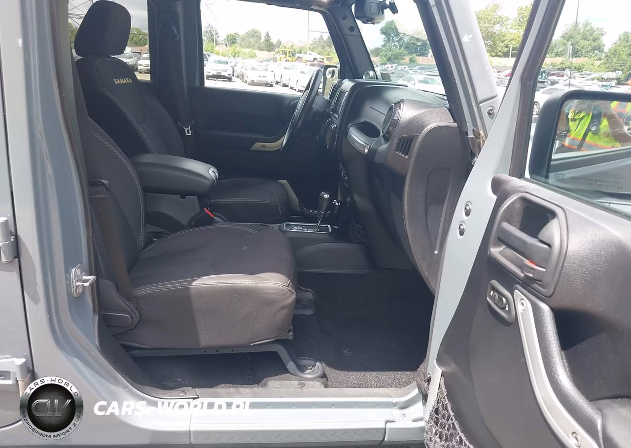 2014 Jeep Wrangler Unlimited Sahara VIN:1C4HJWEG7EL270468 - 5