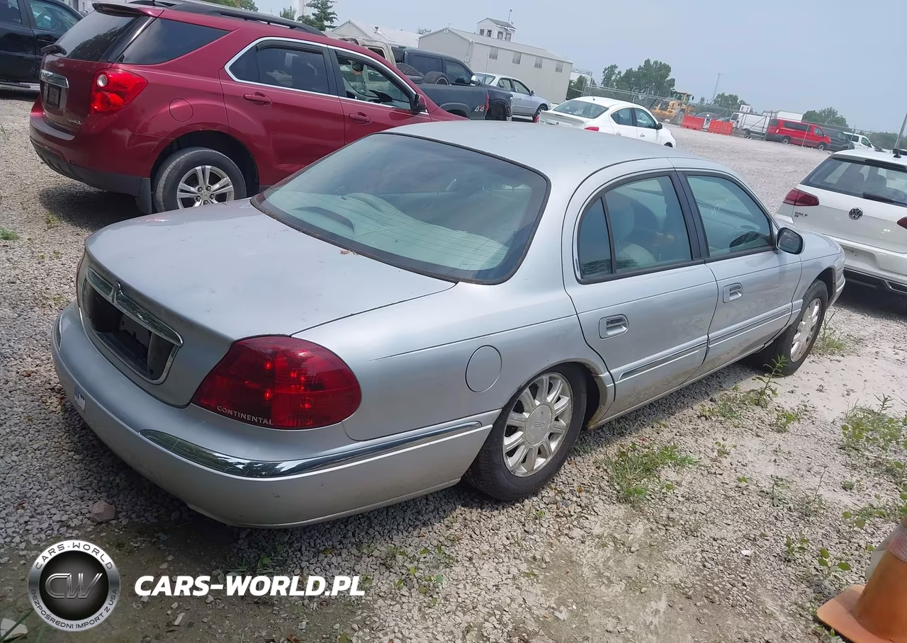 2000 Lincoln Continental VIN:1LNHM97V0YY814655 - 4