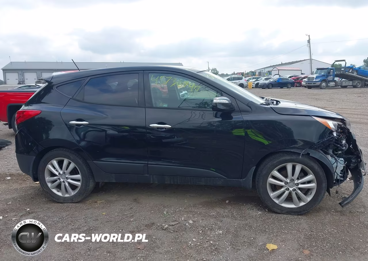 2011 Hyundai Tucson Limited VIN:KM8JUCAC4BU294481 - 13