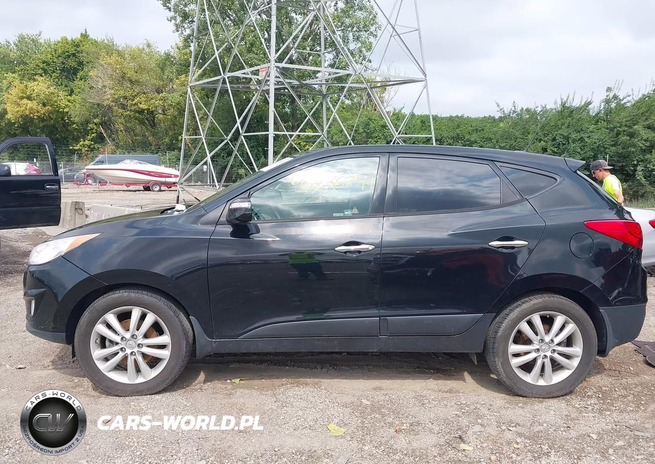 2011 Hyundai Tucson Limited VIN:KM8JUCAC4BU294481 - 14