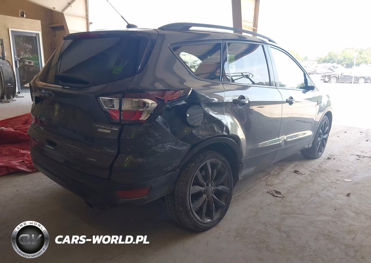 2017 Ford Escape Titanium VIN:1FMCU0JD9HUC31420 - 4