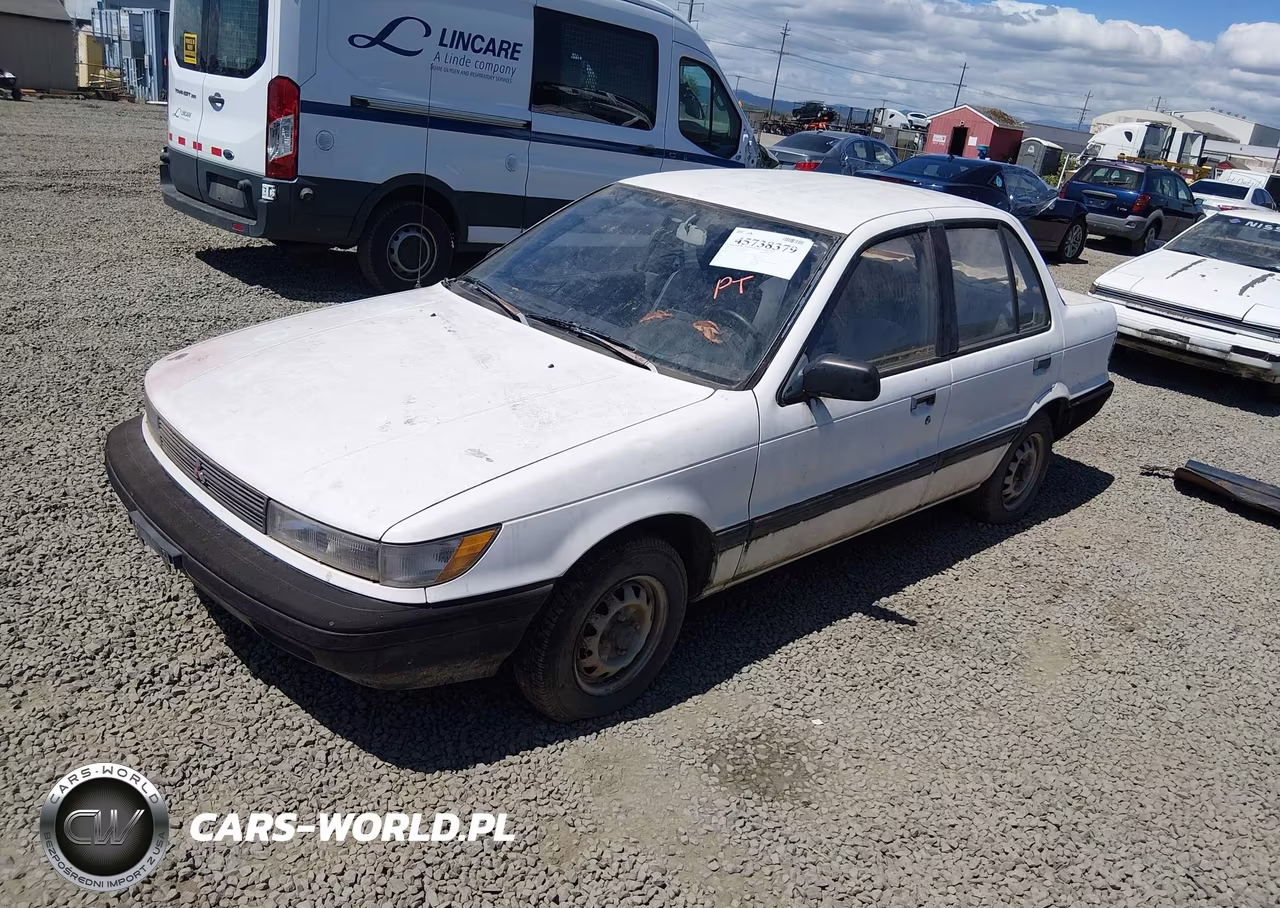 1990 Mitsubishi Mirage VIN:JA3CU26XXLU031415 - 2
