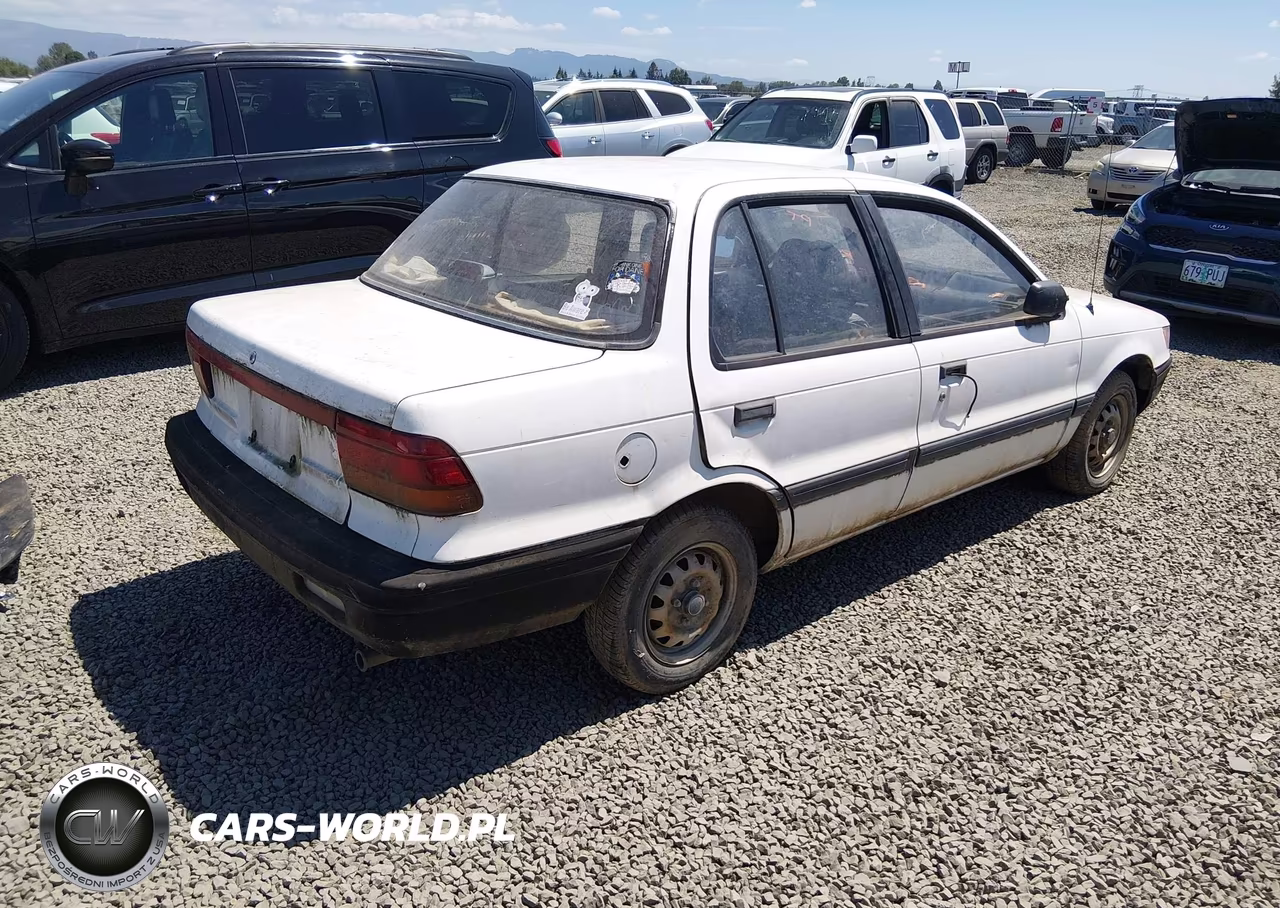 1990 Mitsubishi Mirage VIN:JA3CU26XXLU031415 - 4