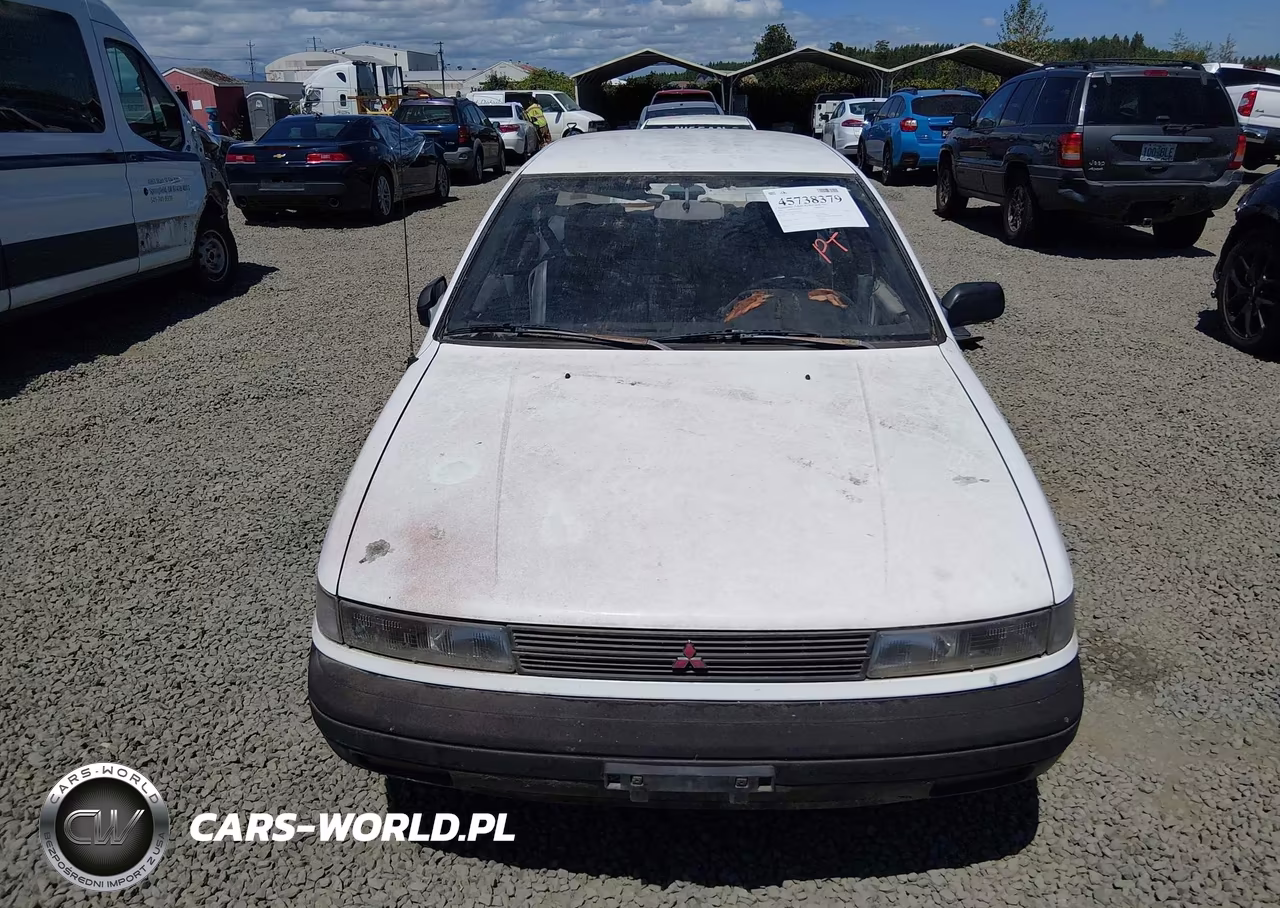 1990 Mitsubishi Mirage VIN:JA3CU26XXLU031415 - 6