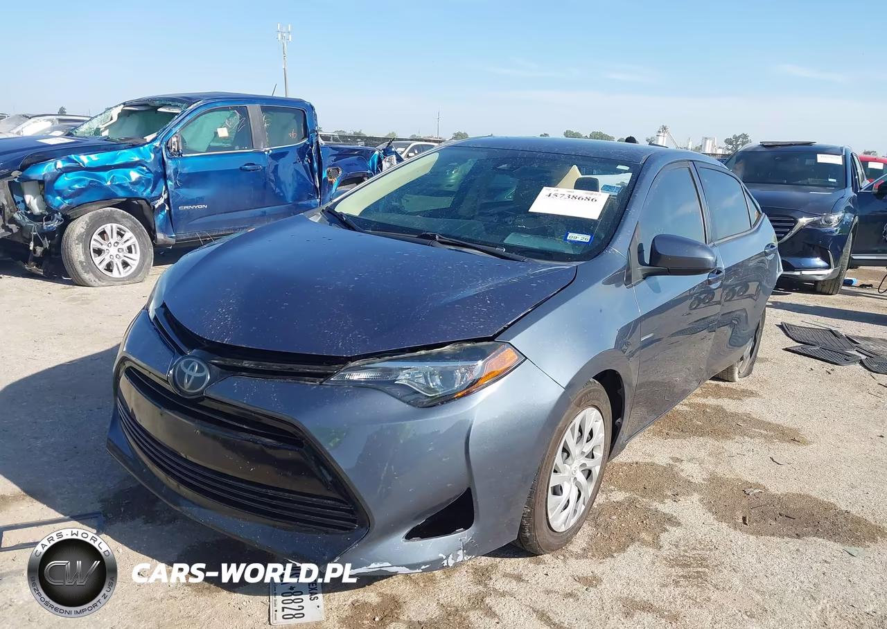 2018 Toyota Corolla Le VIN:5YFBURHE7JP830631 - 2