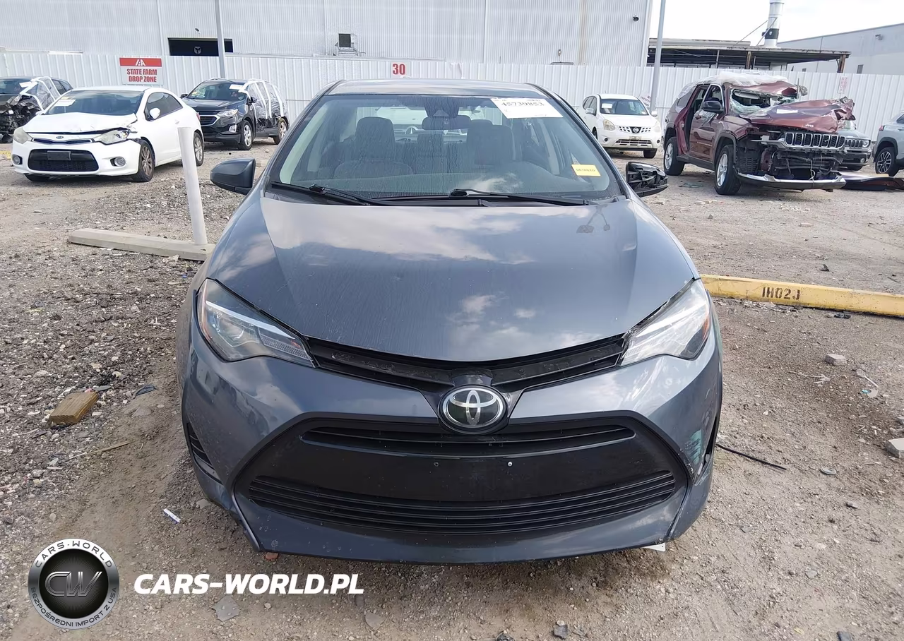 2018 Toyota Corolla Le VIN:5YFBURHE7JP853617 - 12