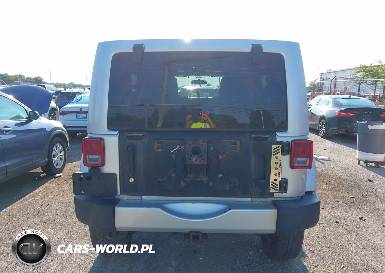 2012 Jeep Wrangler Unlimited Sahara VIN:1C4BJWEG9CL178278 - 16