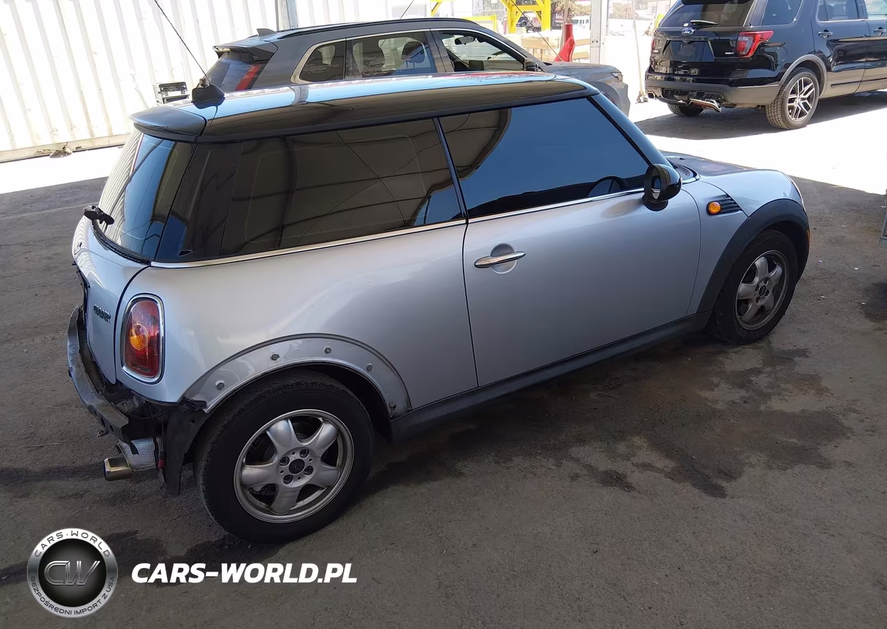 2009 Mini Cooper VIN:WMWMF33569TW78219 - 4