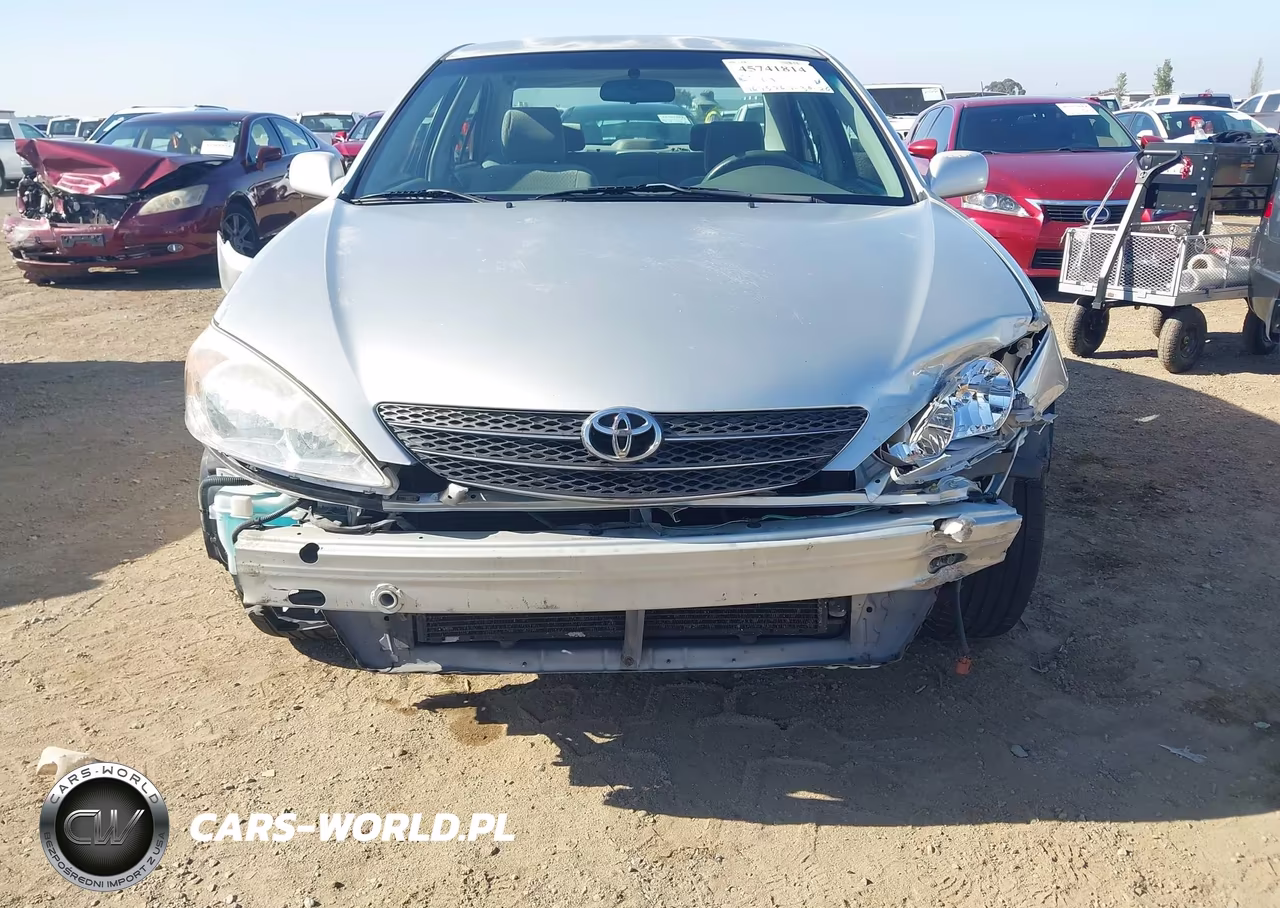 2002 Toyota Camry Le VIN:JTDBE32K120135467 - 13
