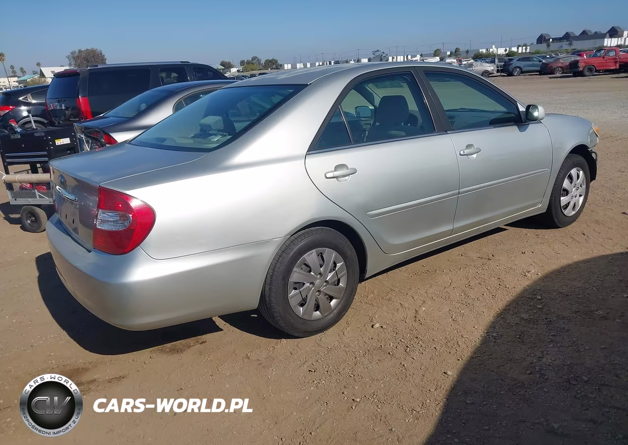 2002 Toyota Camry Le VIN:JTDBE32K120135467 - 4