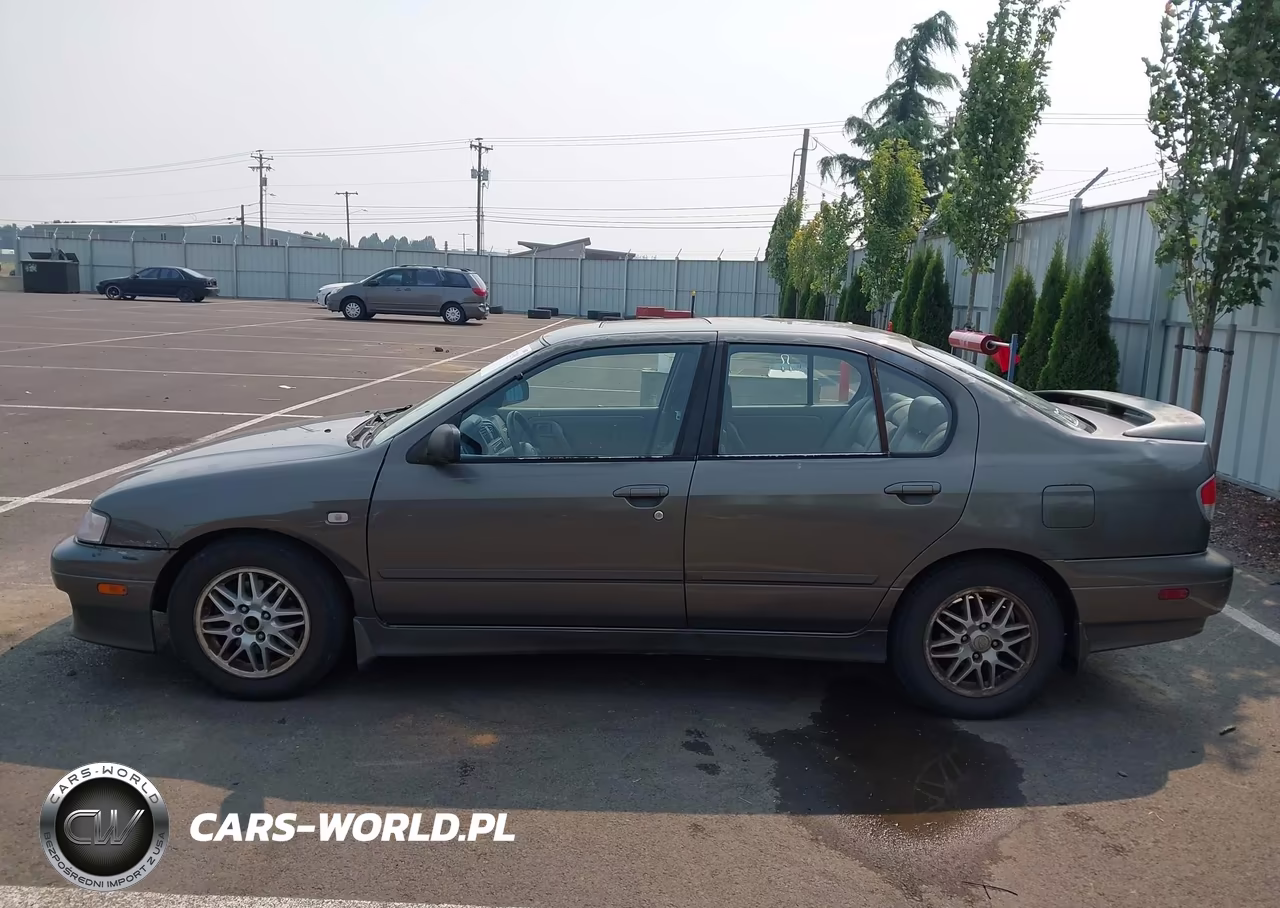 2001 Infiniti G20 Luxury VIN:JNKCP11A71T406667 - 14
