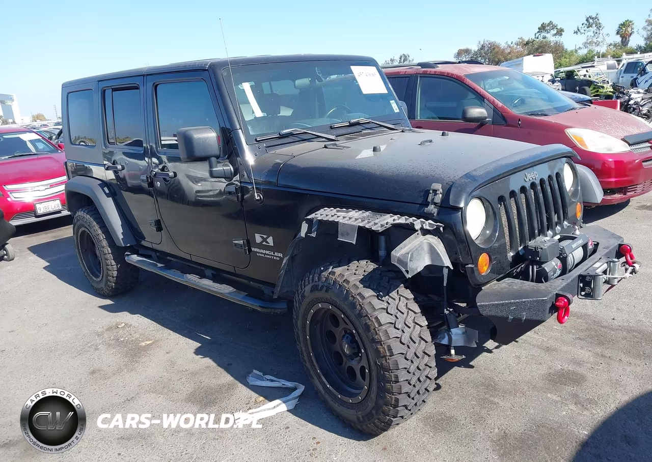2007 Jeep Wrangler Unlimited X VIN:1J4GA39177L169993 - 1