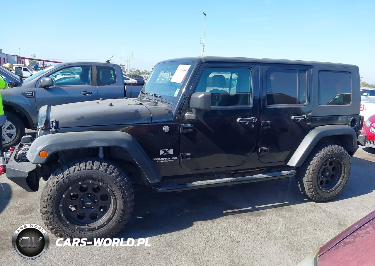 2007 Jeep Wrangler Unlimited X VIN:1J4GA39177L169993 - 14