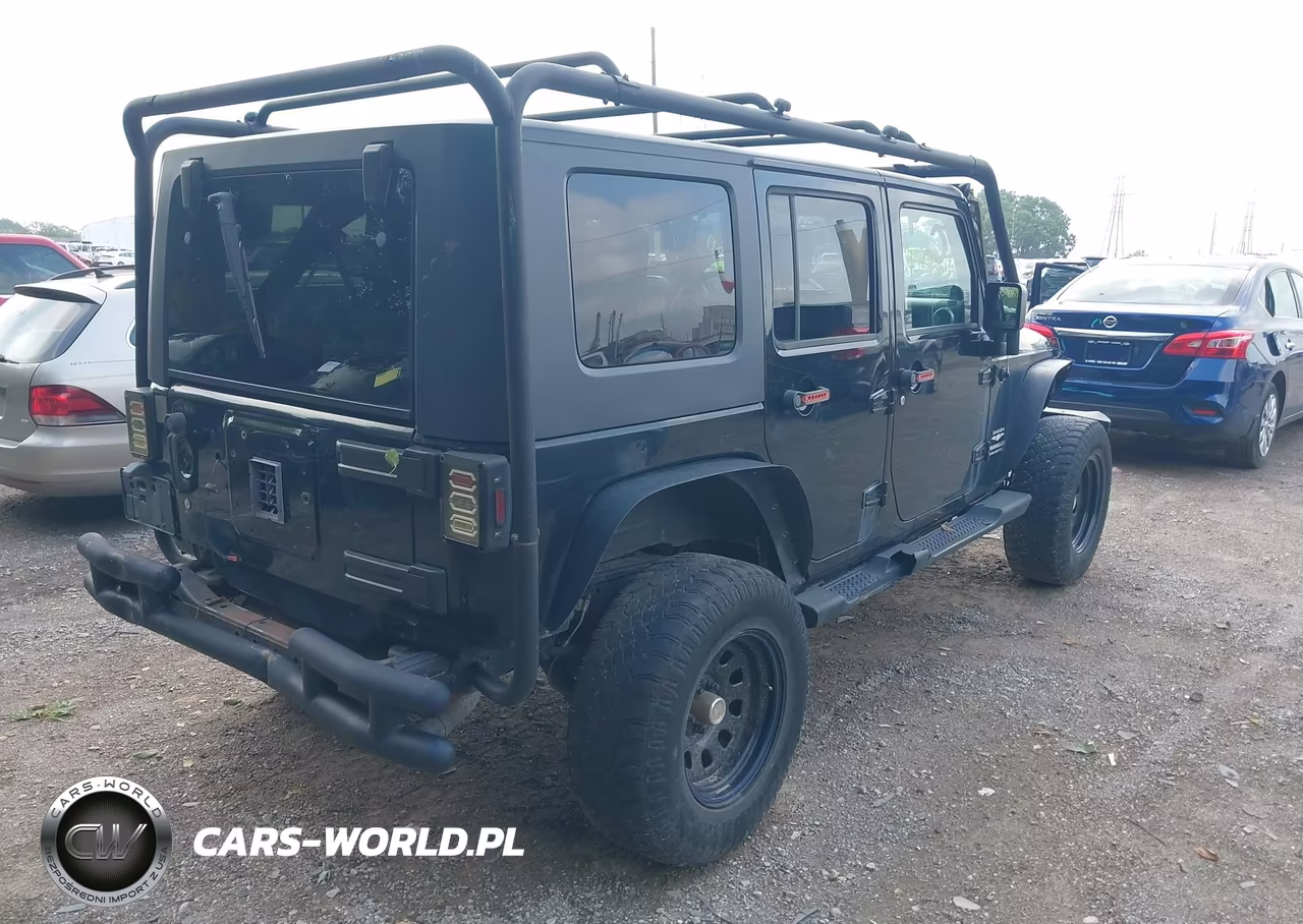 2009 Jeep Wrangler Unlimited Sahara VIN:1J4GA59109L707920 - 4