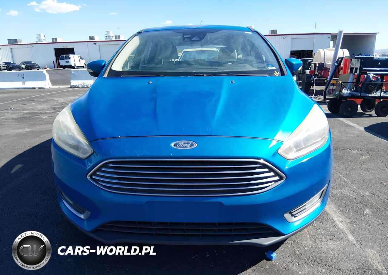2016 Ford Focus Titanium VIN:1FADP3N29GL335507 - 12