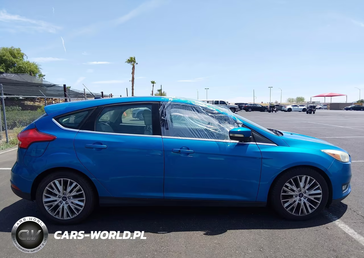 2016 Ford Focus Titanium VIN:1FADP3N29GL335507 - 13