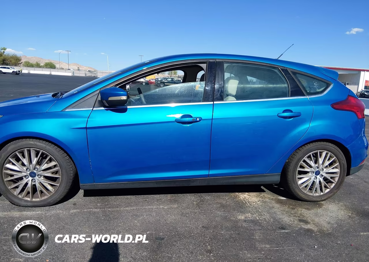 2016 Ford Focus Titanium VIN:1FADP3N29GL335507 - 14